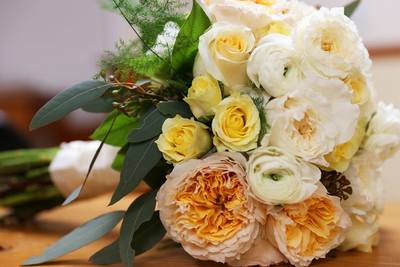Peach David Austin Garden Roses, White Garden Roses, Yellow Spray Roses, White Ranunculus Hand Tied Bridal Bouquet